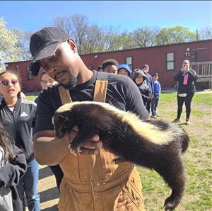 man holding an animal