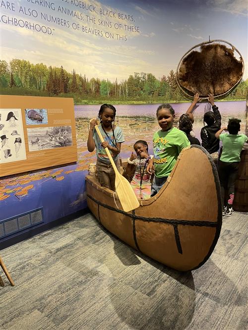 3 3rd grade student in a canoe