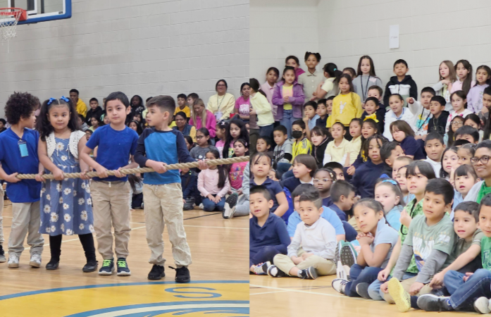  Students observing and participating in tug-o-war pep rally game