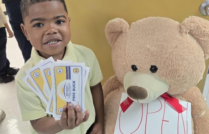  Boy posing with PBIS incentive