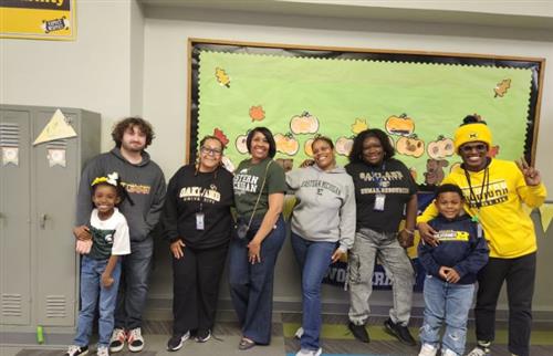  Staff and students with Michigan College gear on