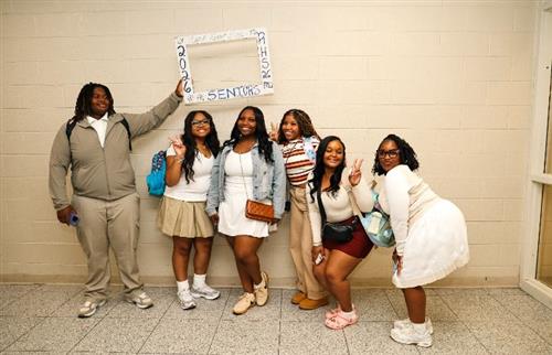  Seniors pictured in the hallway posing