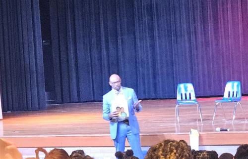 Darnell Blackburn introducing the book I Believe I Can by Grace Byers