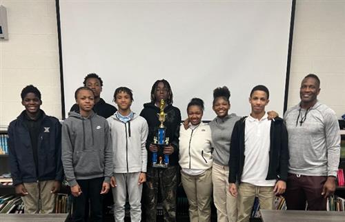  Boys Basketball team and Coach Miller