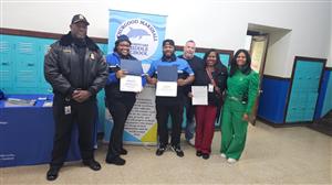  picture of staff with the security team