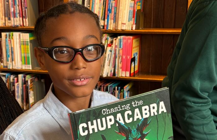  Students holding book