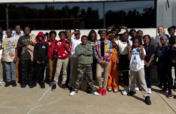  students and teachers smiling at cranbrook