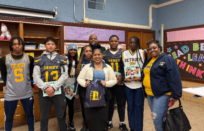  students smiling with Wayne Principal