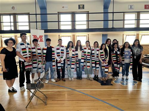  students posing with MIHC