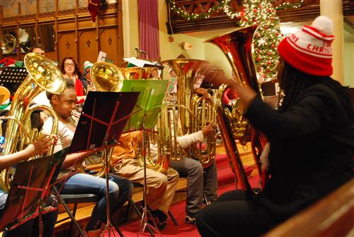 Students and Ms. Moore at a Very Tuba Christmas 