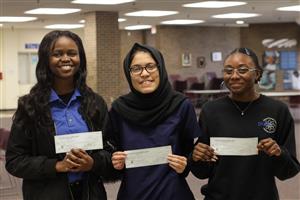 Students with checks won for poetry contest 