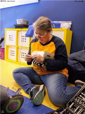 Mrs. Schwendemann building a robot 