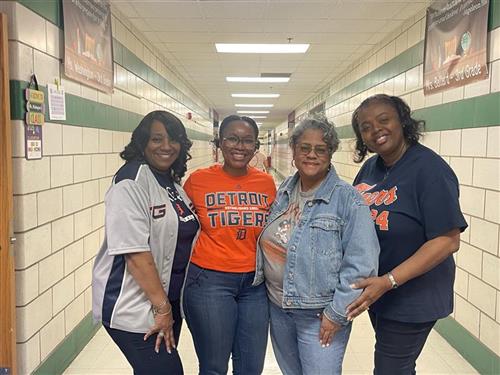  four teachers wearing tiger gear