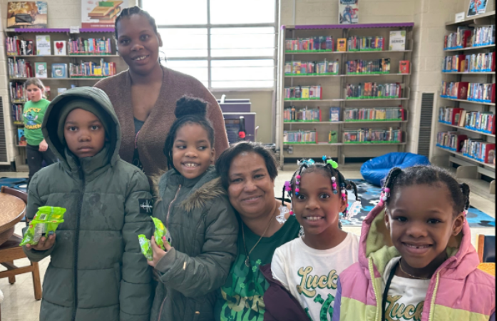  Principal Scott and students and parent at library