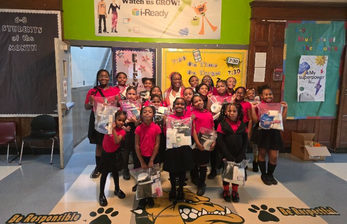  Students standing with their community service project