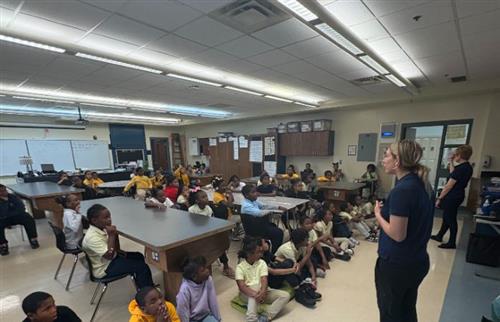  Students listening to the presentation