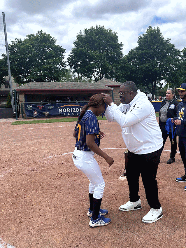 Principal with the softball team