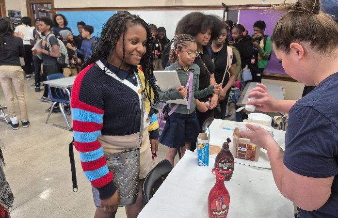  Students waiting in line to get ice cream