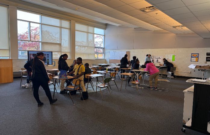 students in room playing